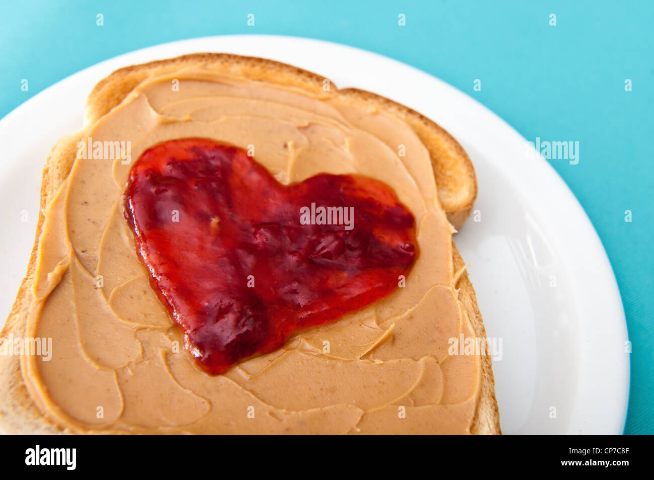 Peanut butter and jelly on toast served for valentines day Stock Photo Alamy