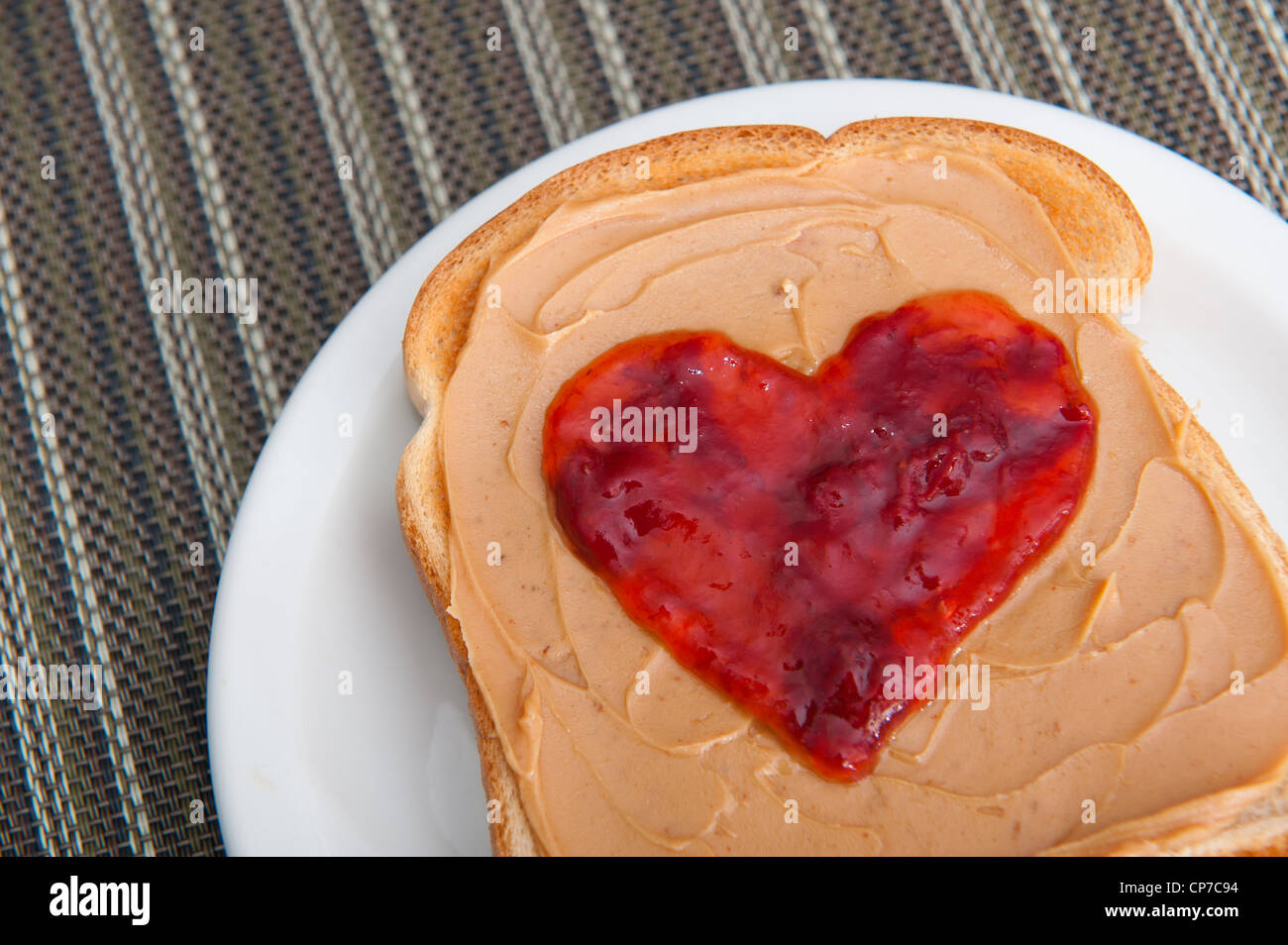 Peanut butter and jelly on toast served for valentines day Stock Photo