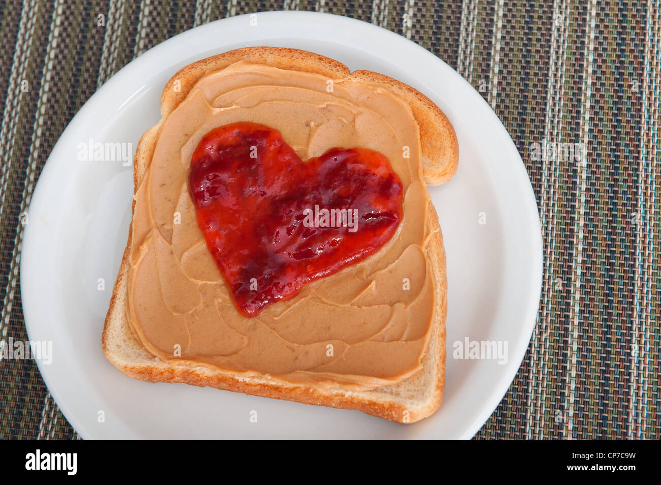 Peanut butter and jelly on toast served for valentines day Stock Photo Alamy