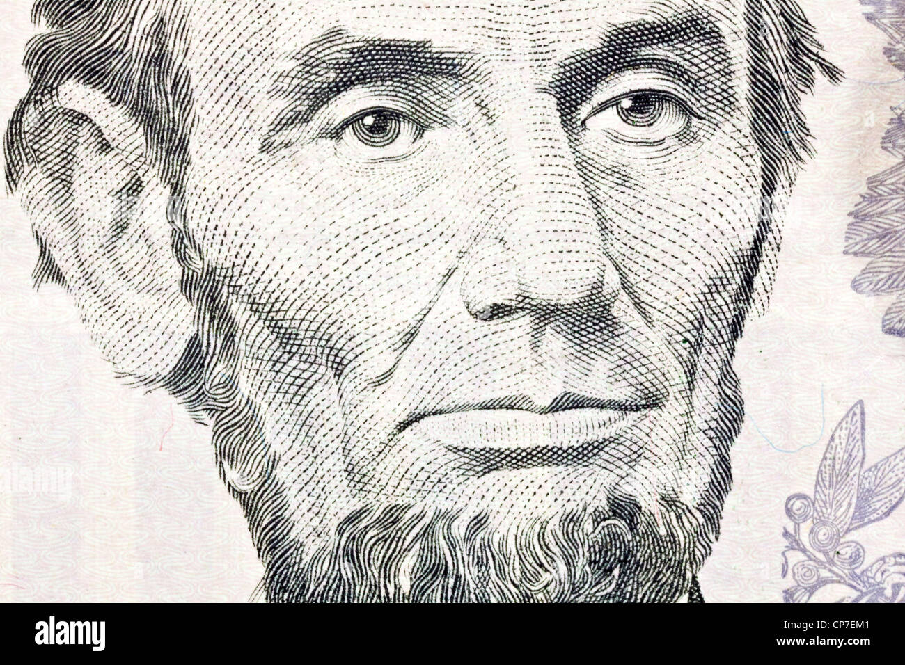 Macro of Abe Lincoln on the US five dollar bill. Stock Photo