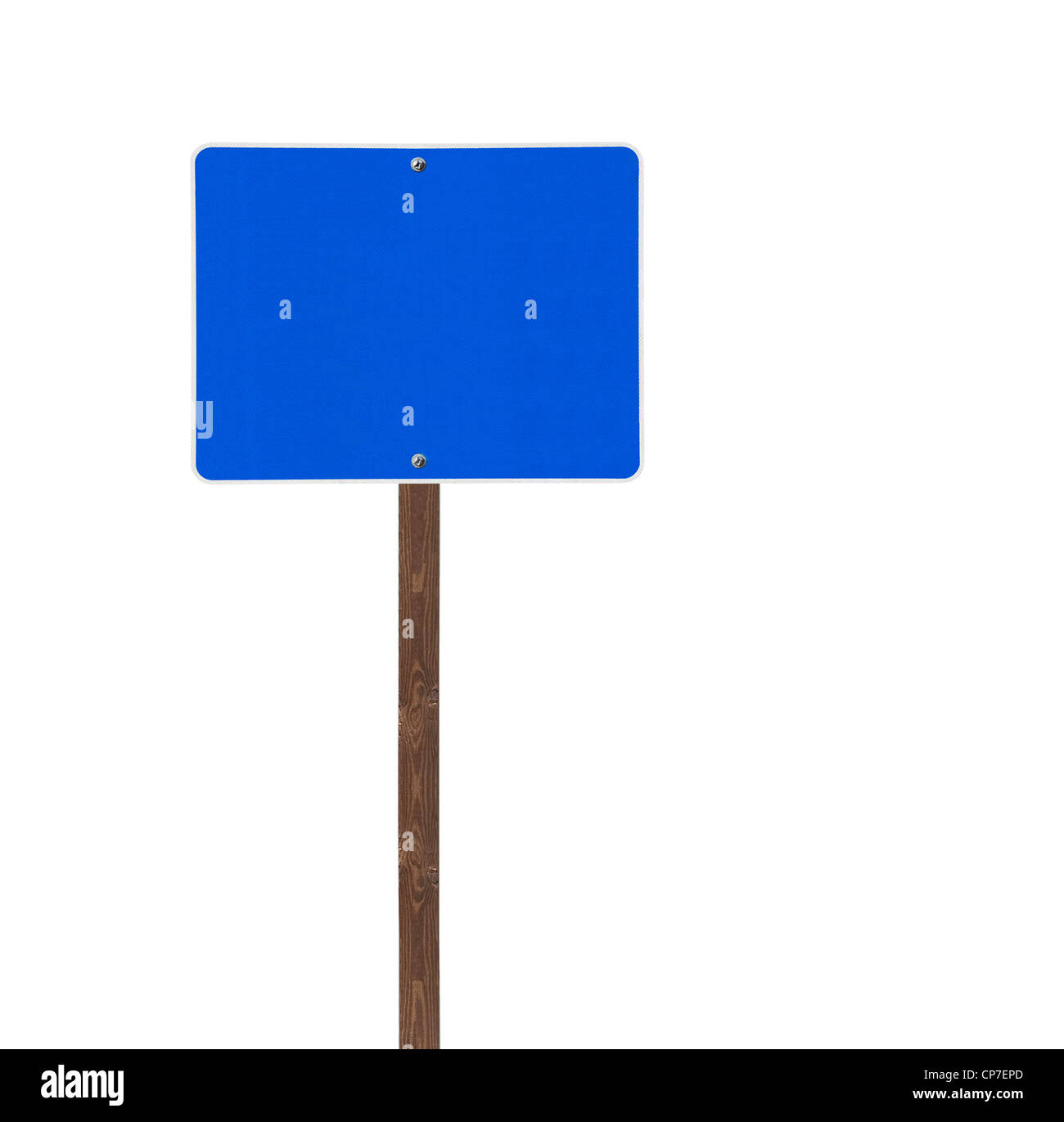 Tall isolated blue road sign on a wooden post. Stock Photo