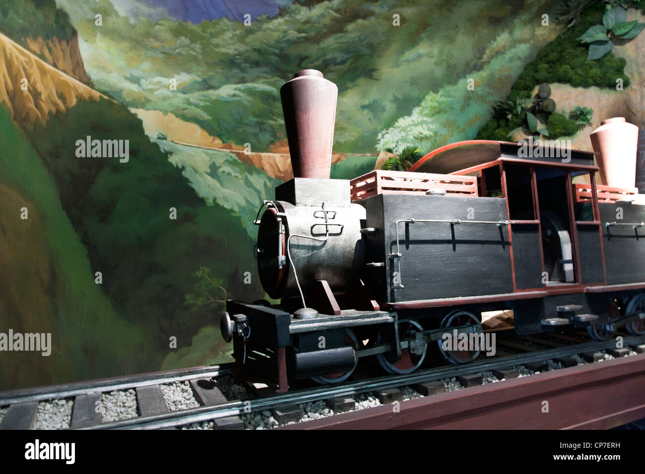 diorama with steam locomotive crossing mountain shows progress made by dictator Porfirio Diaz at expense of social repression Stock Photo