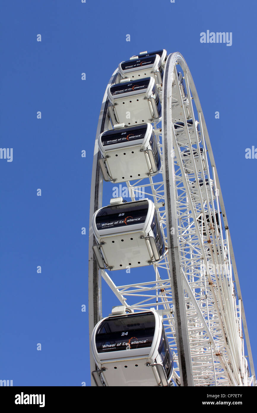 Wheel Empty WIDE VIEW OF A EMPTY WHITE FERRIS WHEEL AGAINST BLUE SKY BACKGROUND BDB ...