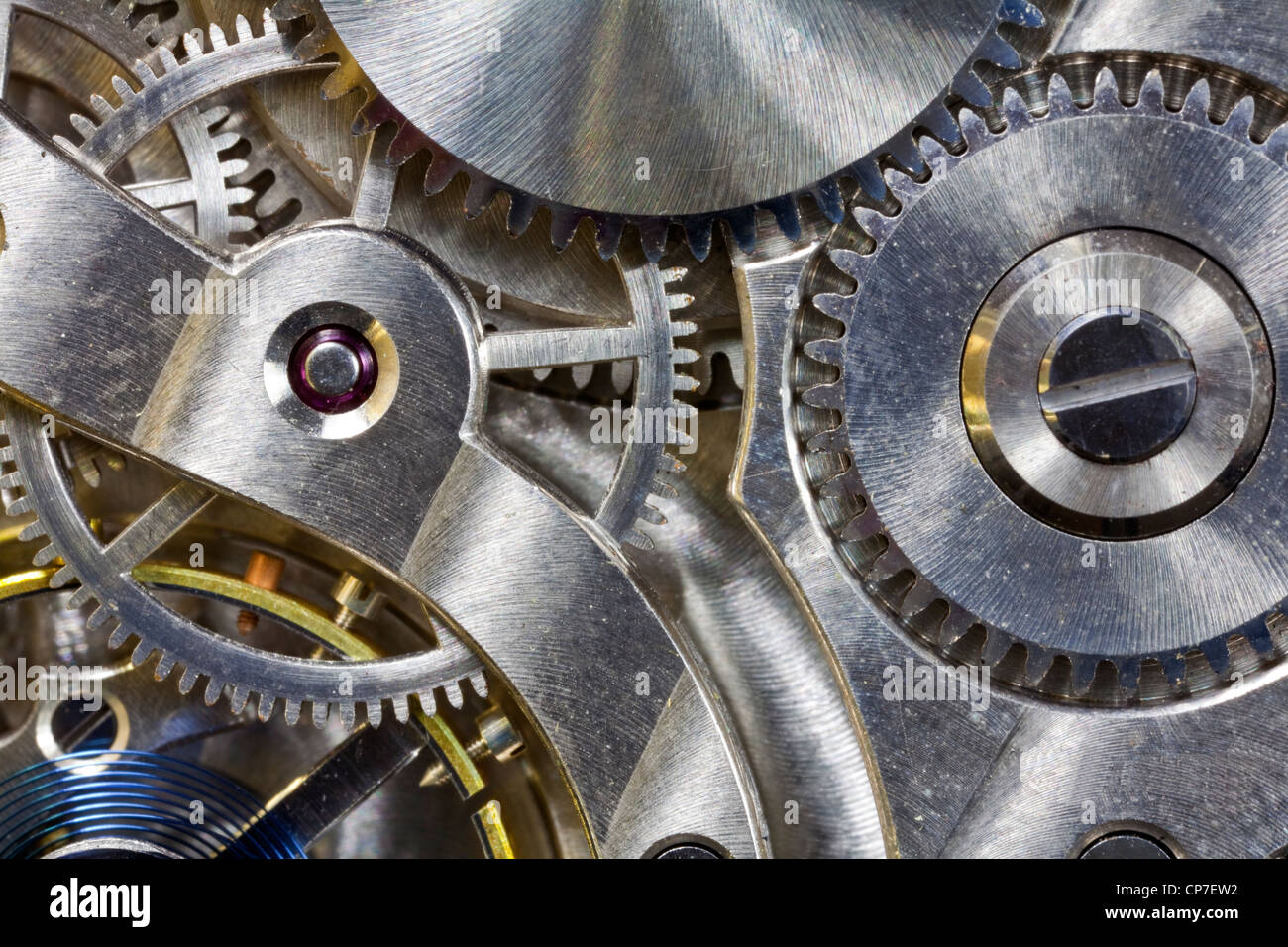 Vintage pocket watch inside gears macro detail. Stock Photo