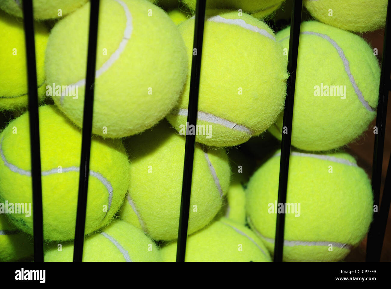 close up of tennis balls in a basket Stock Photo