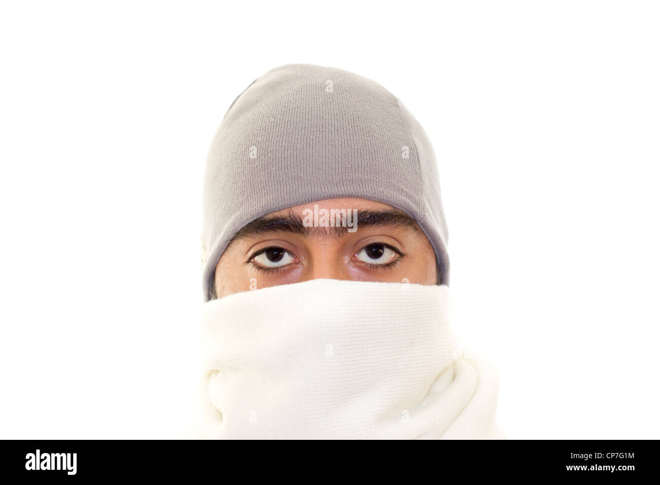 Adult male face in winter clothing isolated in white - Stock Image