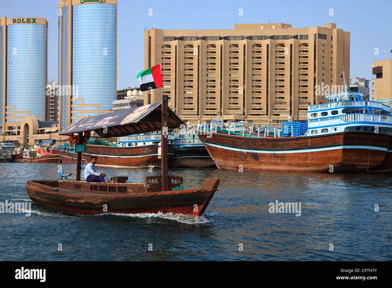 Traditional Water Taxi Abra Sailing On The Dubia Creek In The