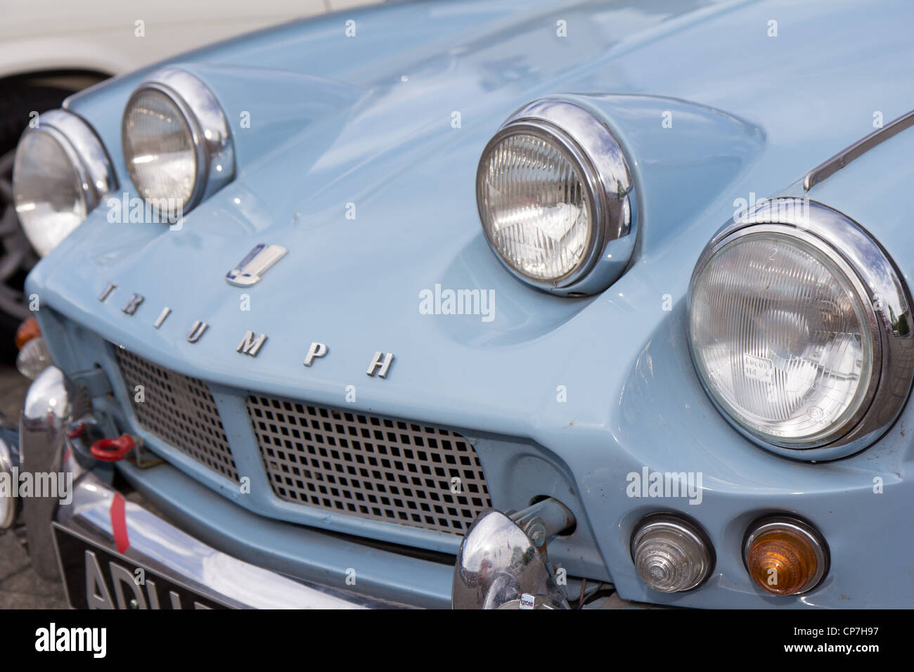 Vintage race car headlights of TRIUMPH Spitfire 1500 from 1978 on display at Grand Prix in Mutschellen, SUI on April 29, 2012. Stock Photo