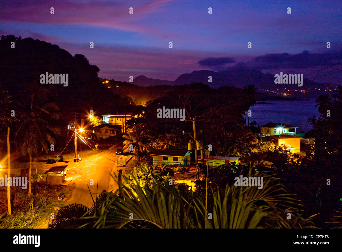 Night scene looking over the little town of Calibishie on the North coast of Dominica West Indies Stock Photo