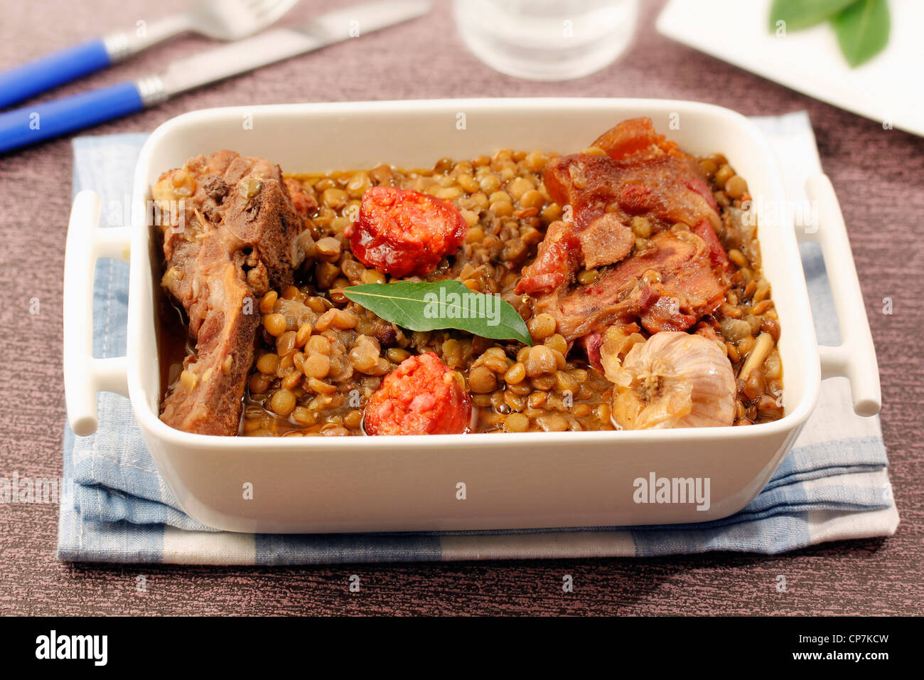 Stewed lentils with chorizo. Recipe available. Stock Photo