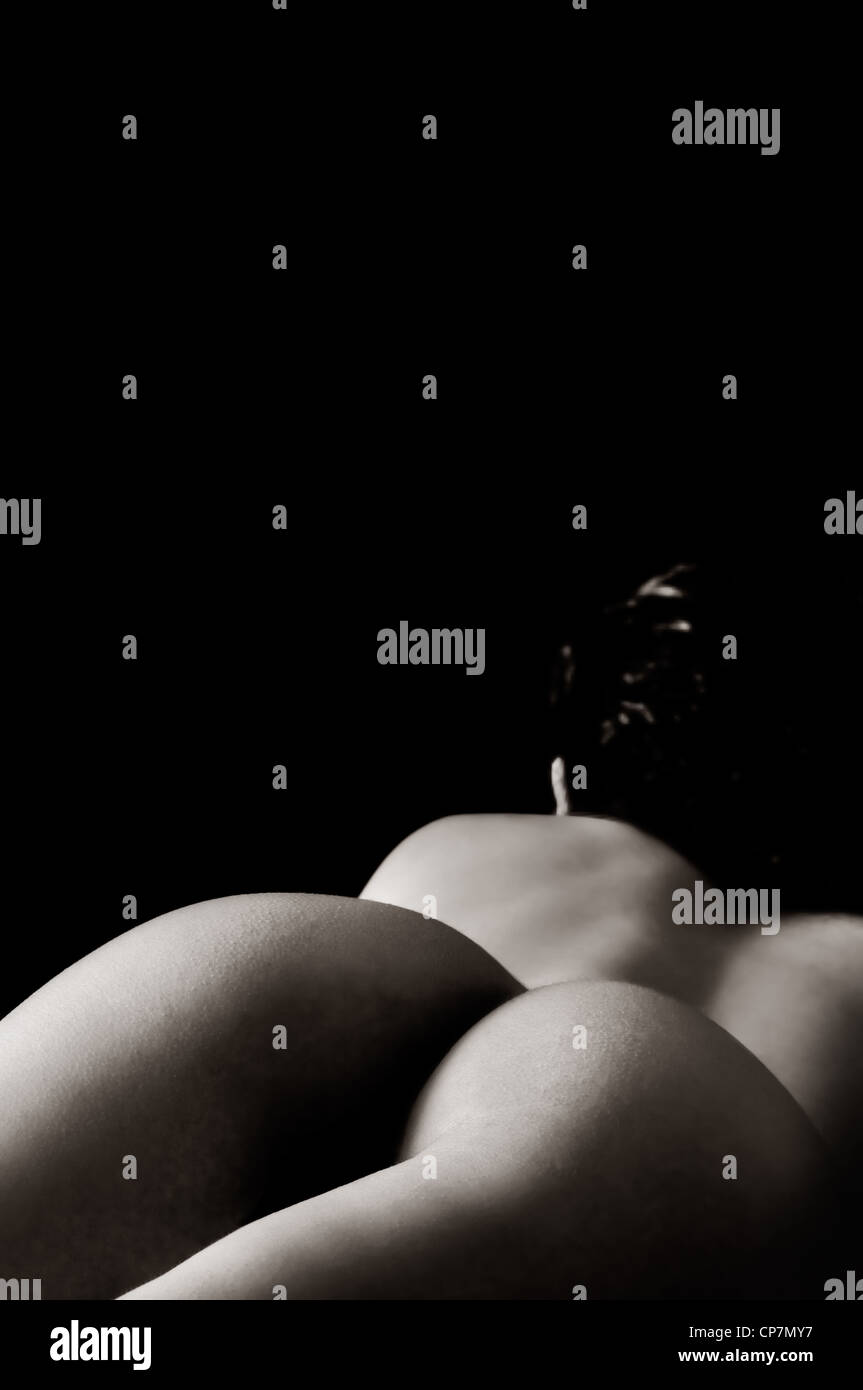 Naked or nude sexy woman back on black background.Low key light.Room for  text Stock Photo - Alamy