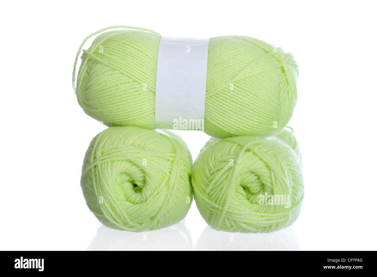 Clew Of Green Thread For Knitting Isolated On White Background