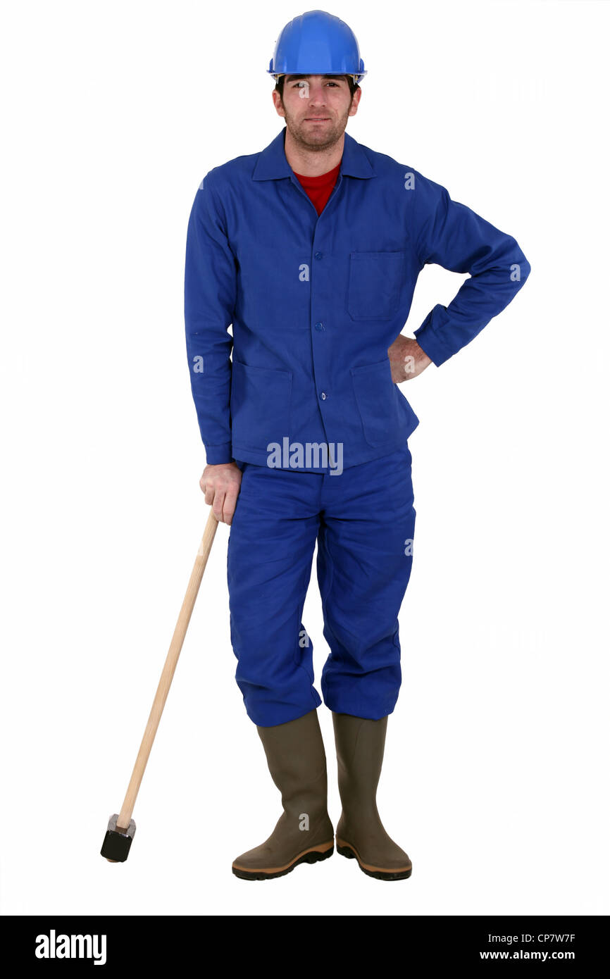 A tired looking labourer Stock Photo Alamy