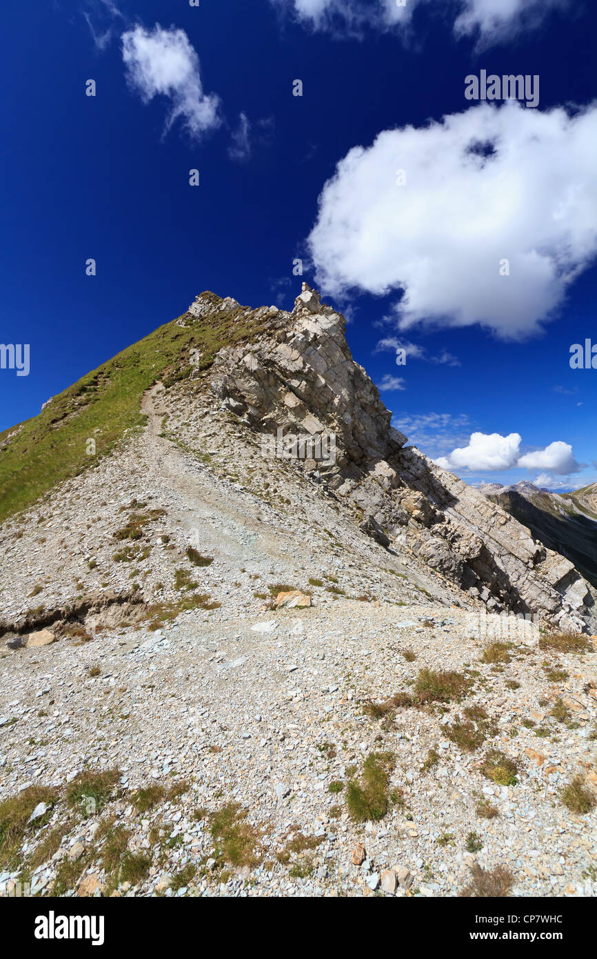 White clouds blue sky over rocks in the dolomites hi-res stock ...