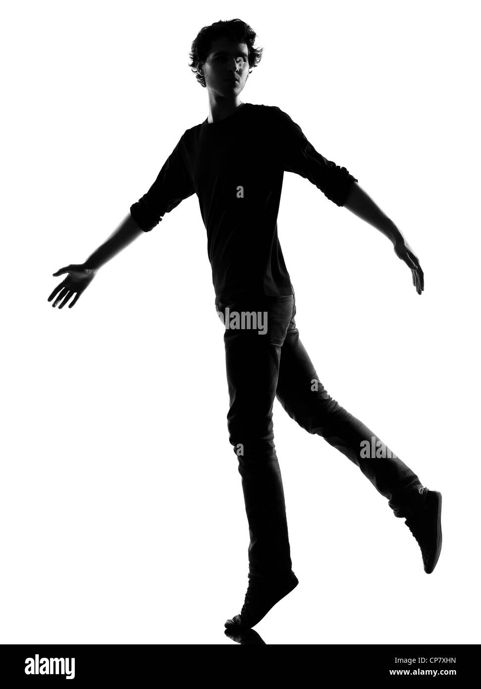 young man silhouette in studio isolated on white background Stock Photo