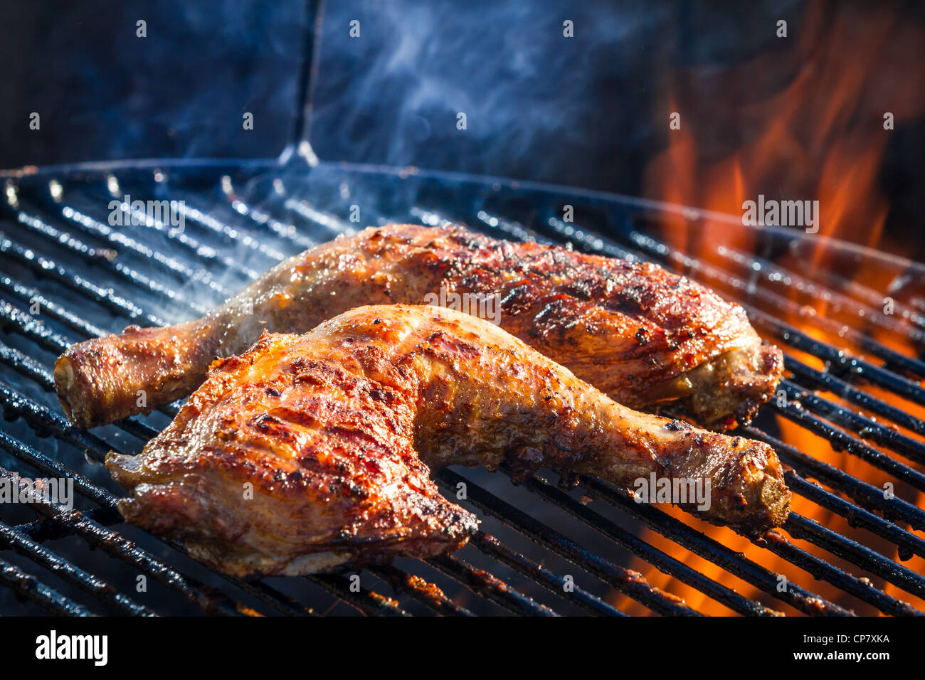Roast chicken leg on grill Stock Photo Alamy