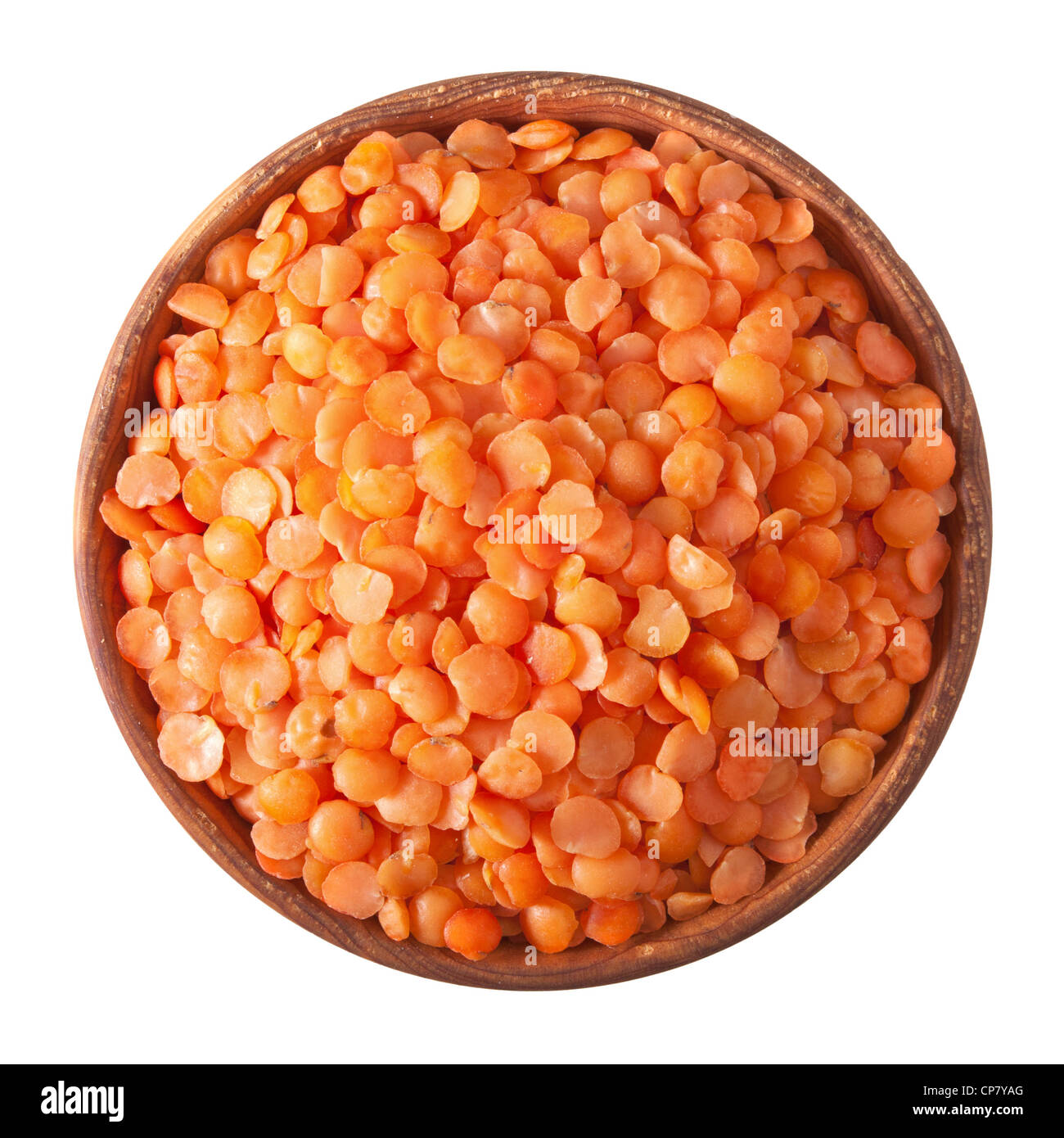wooden bowl full of red split lentils isolated on white background Stock Photo