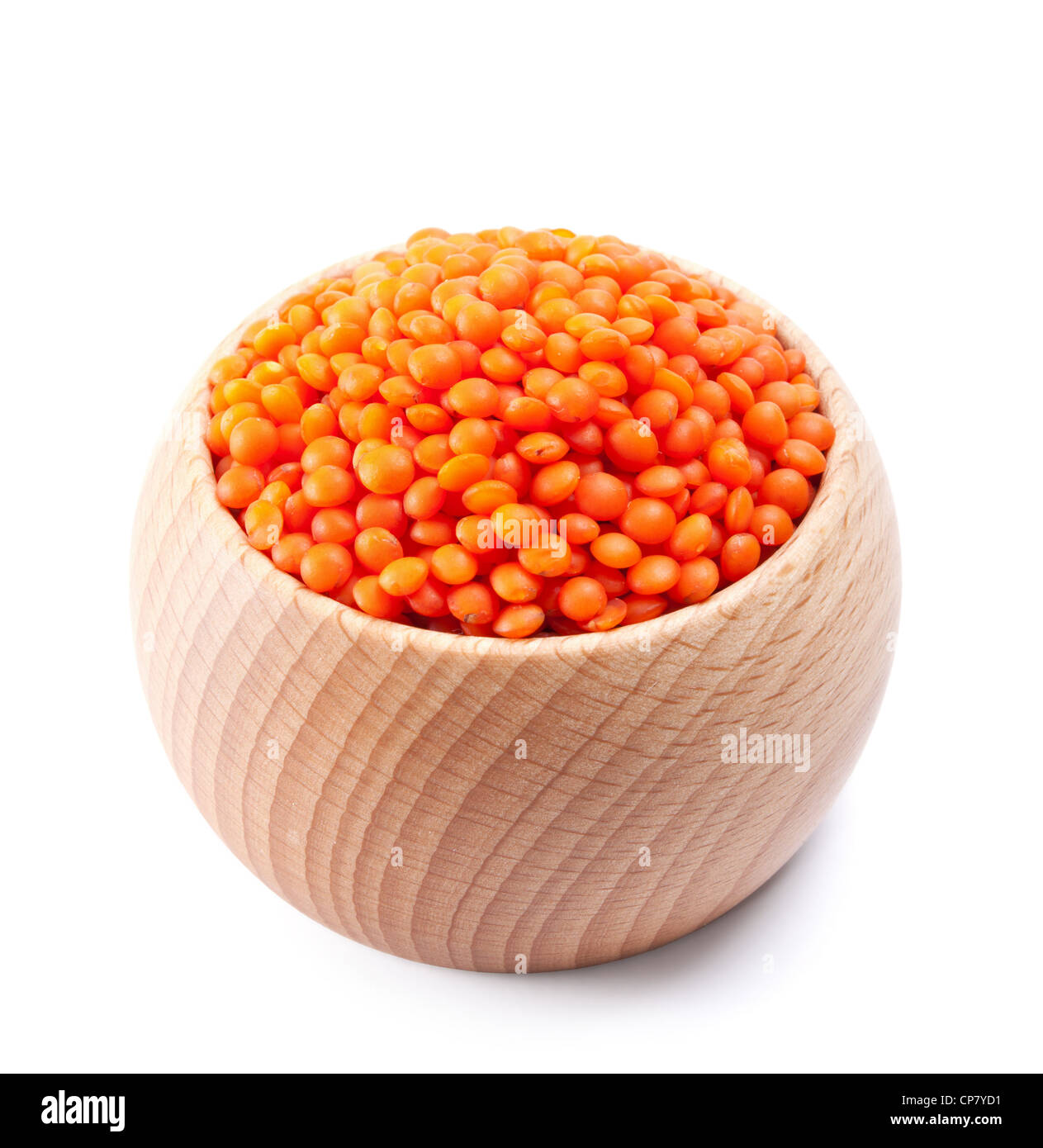 wooden bowl full of red lentils isolated on white background Stock Photo
