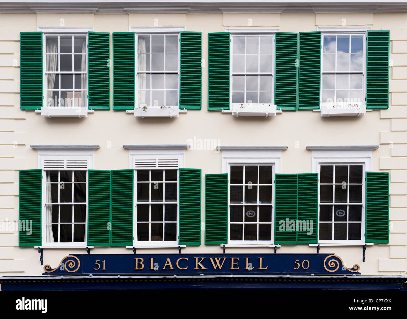Windows and wooden shutters above Blackwells bookshop. Oxford, Oxfordshire, England Stock Photo