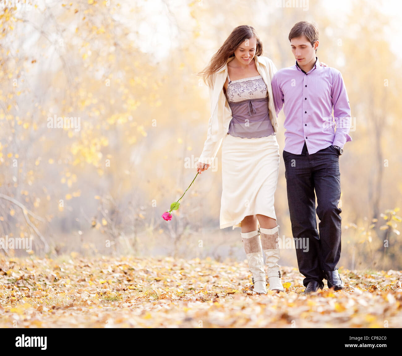 happy young couple in the park Stock Photo - Alamy