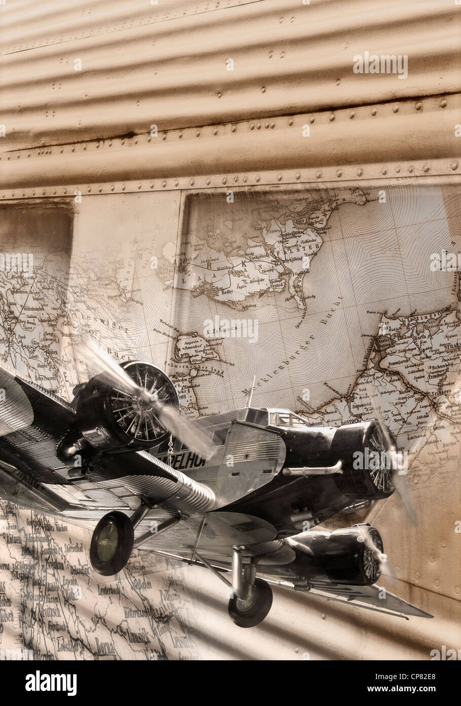 Composing of a Junkers-52 with portions of a historic map of Germany Stock Photo