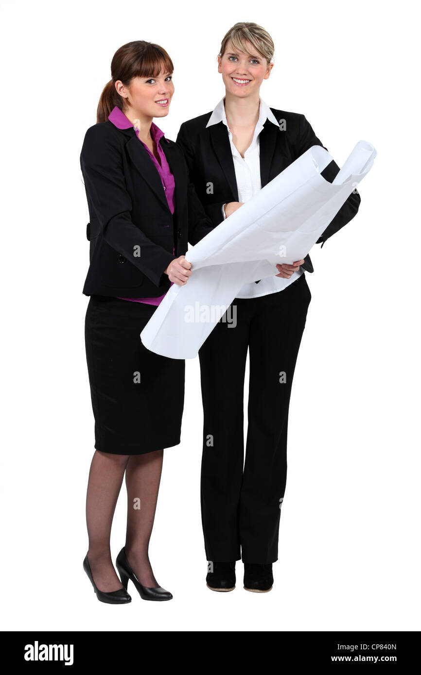 Going over the plans Stock Photo - Alamy