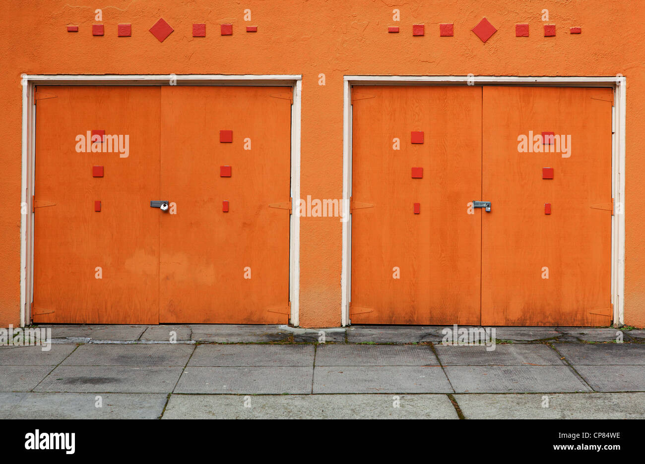 Pair Of 1950 S Style Orange Wood Painted Garage Doors Stock Photo