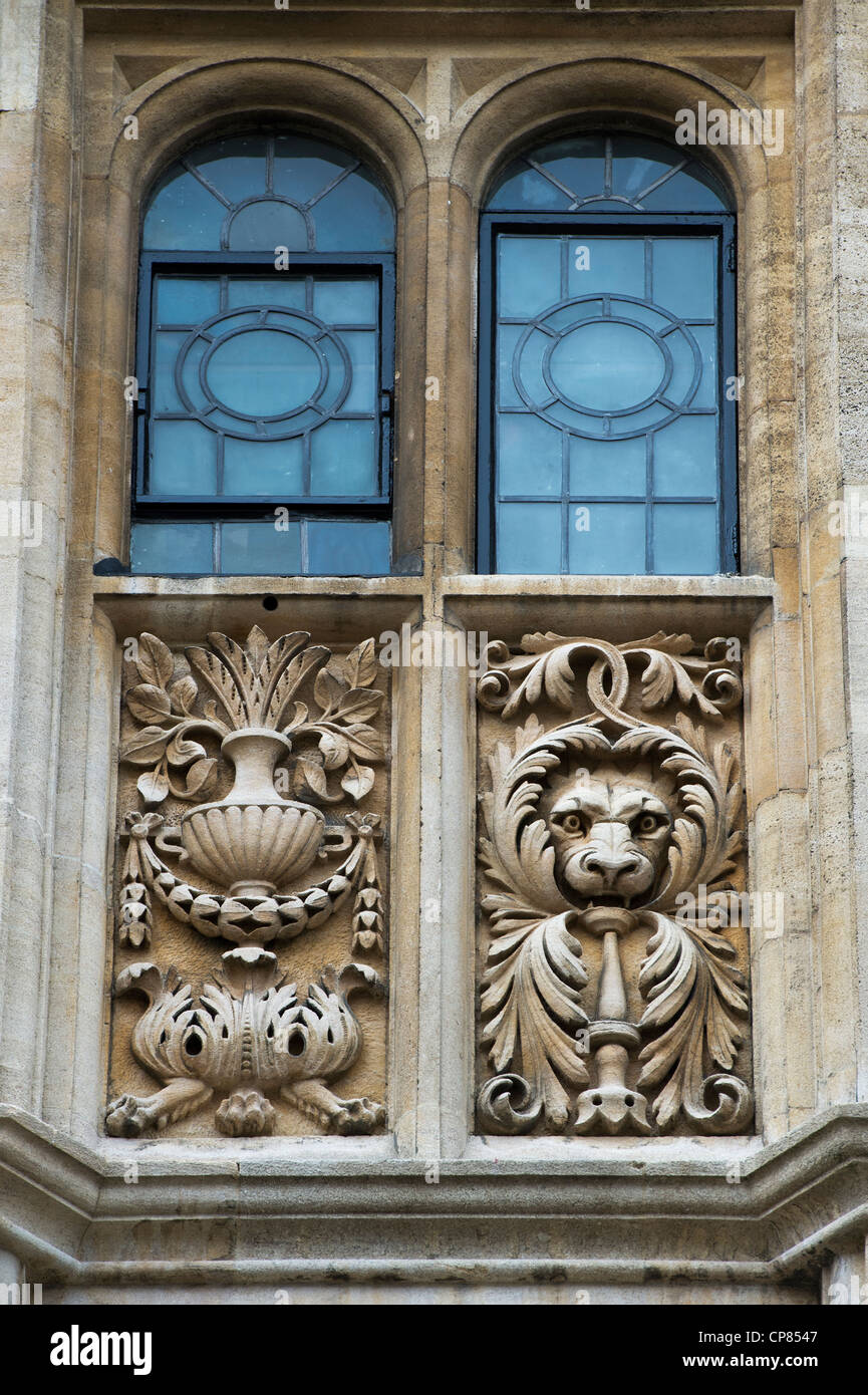 Relief lion and plant sculpture carvings on Oxford University building. Oxford , Oxfordshire, England Stock Photo