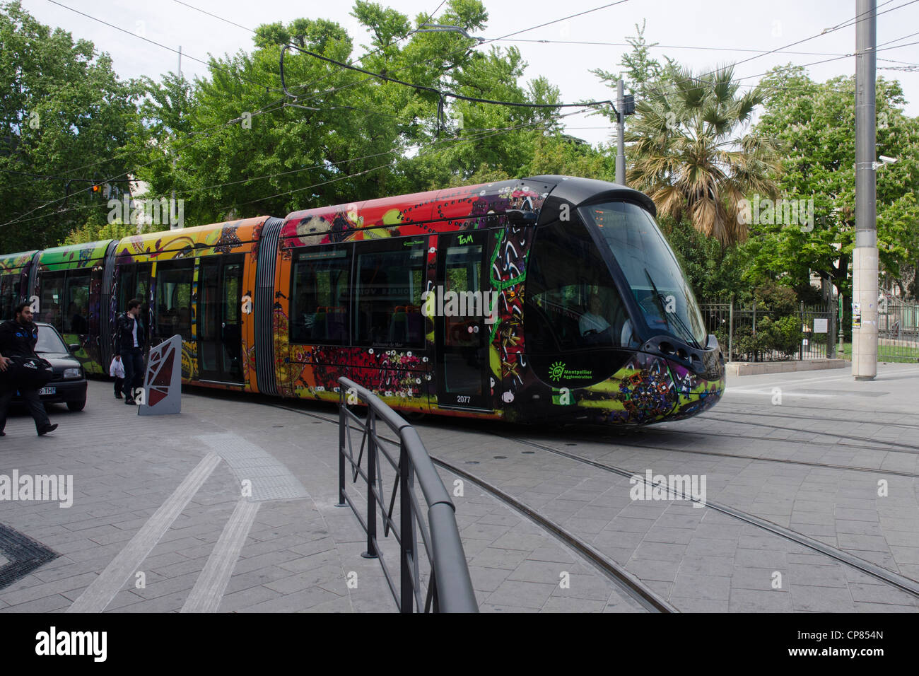New tram approaching railway station in Montpellier, southern France. Stock Photo