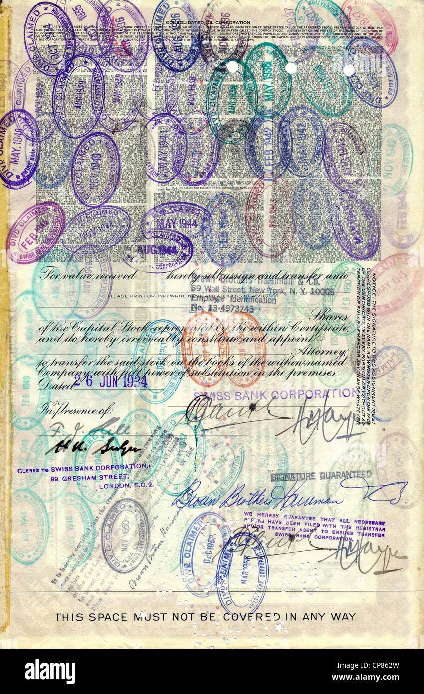 Historical stock certificate, back side with many stamps, owned by the Swiss Bank Corporation, oil company, Consolidated Oil Cor Stock Photo