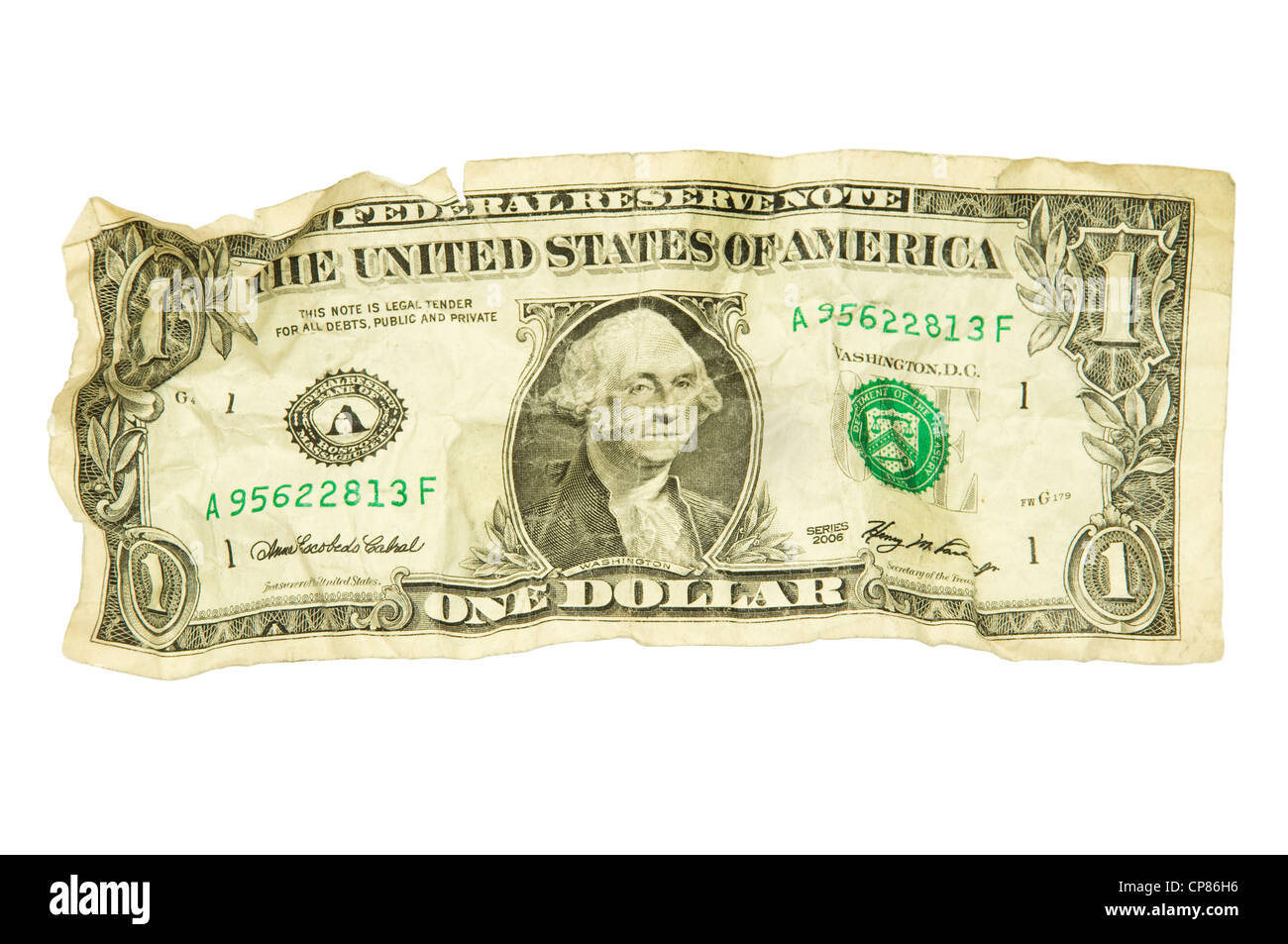 Single crumpled dollar bill aginst white background Stock Photo