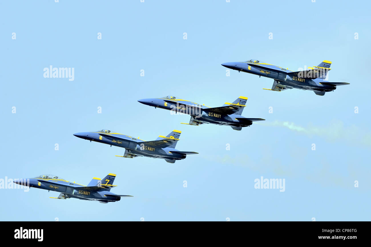 A flyby  by the US Navy Blue Angels aerobatic team, F-18 Hornets Stock Photo