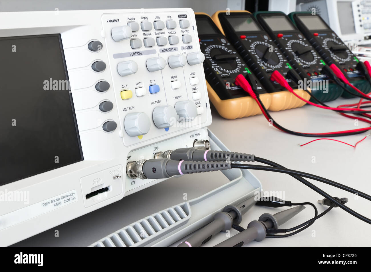 digital oscilloscope and measuring devices with cables ready for measurements in electrical