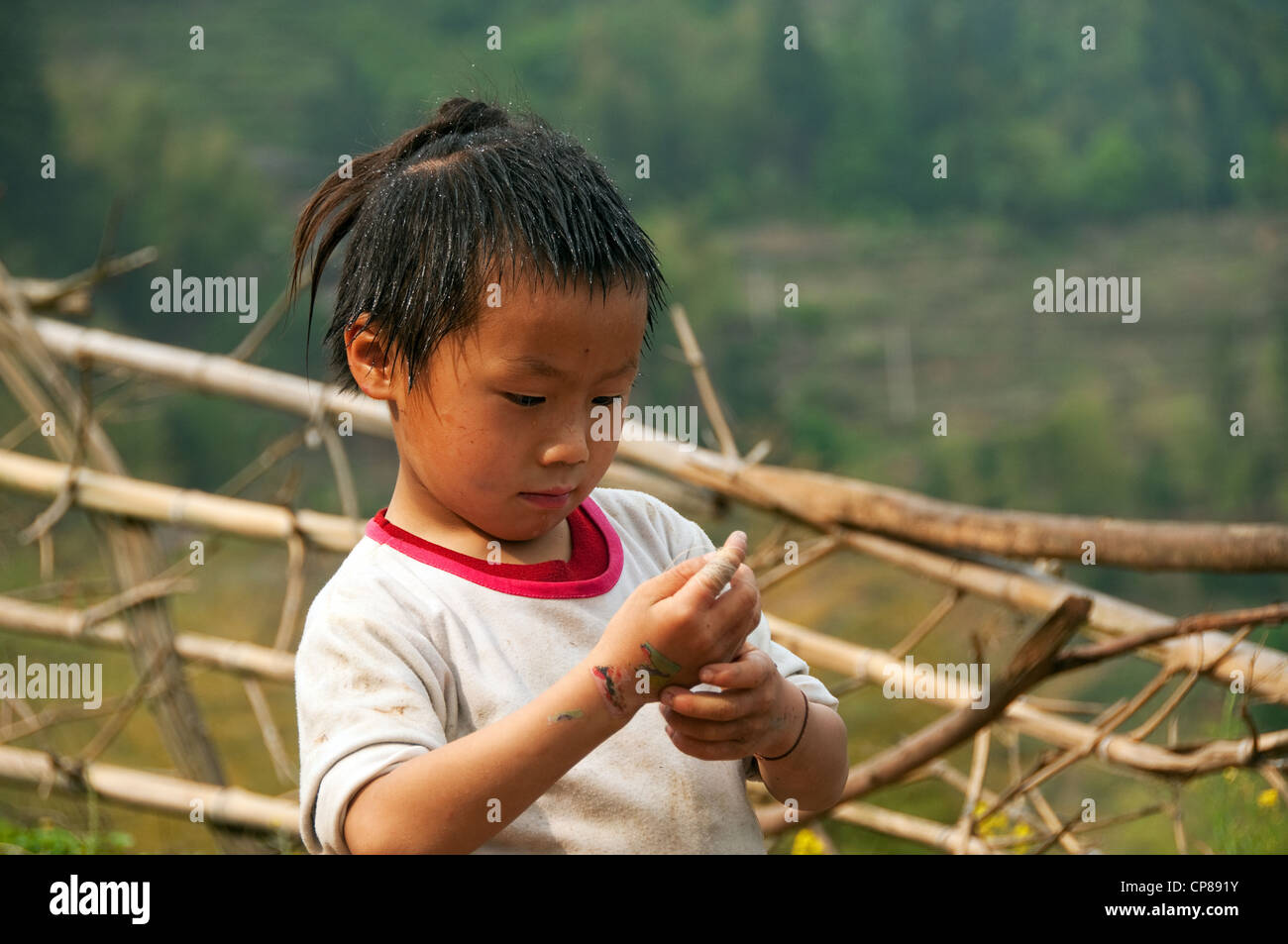 A Basha Miao Gun Men Young Boy With Traditional Hairstyle