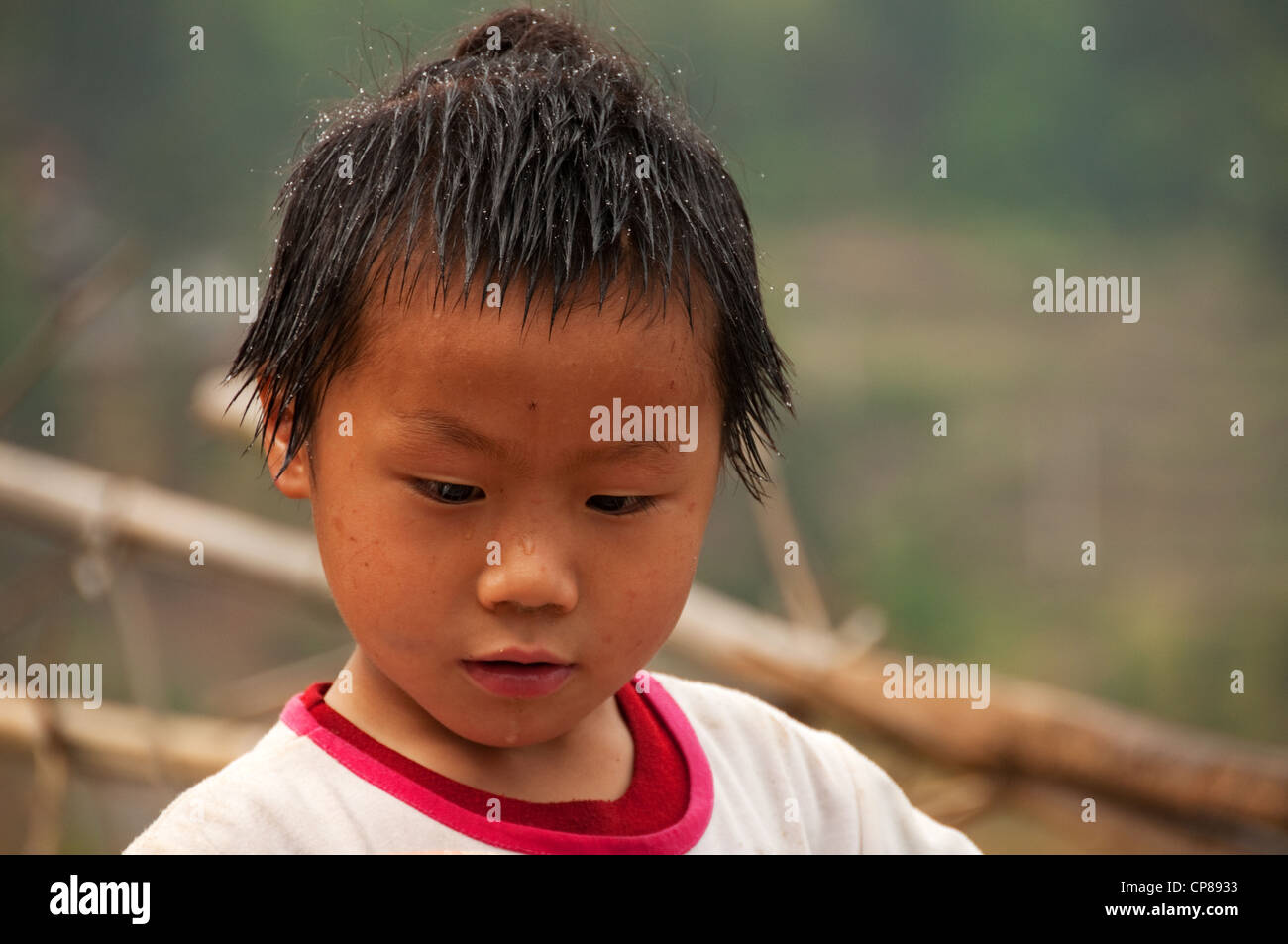A Basha Miao (Gun Men) young boy with traditional hairstyle, Southern China  Stock Photo - Alamy