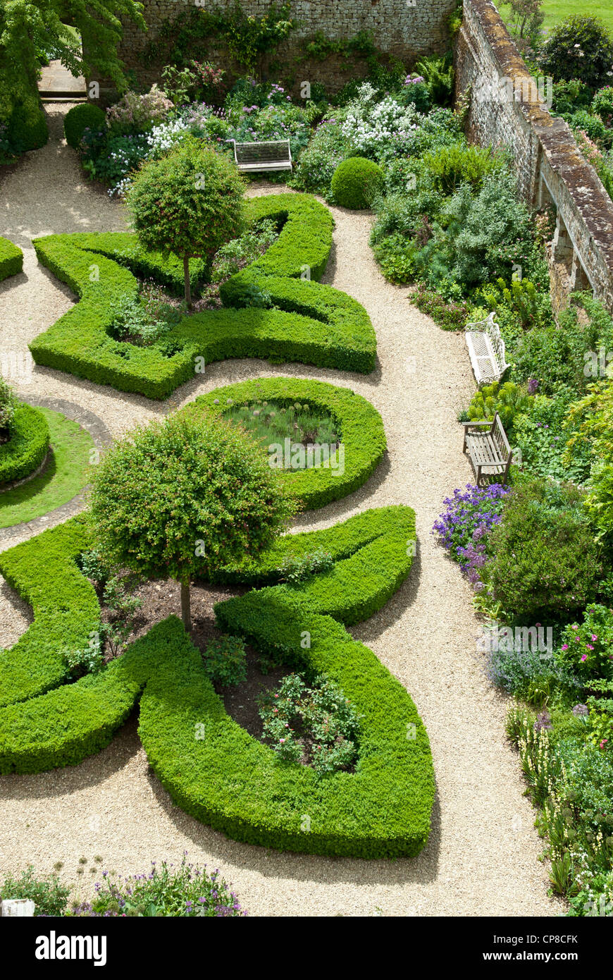 High viewpoint towards the Fleur de Lys gardens of Broughton Castle