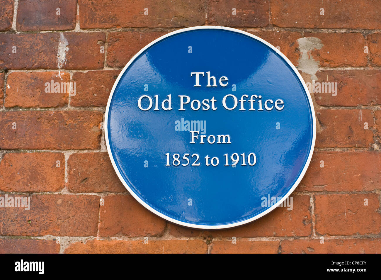 Blue tourist heritage plaque THE OLD POST OFFICE FROM 1852 TO 1910 in