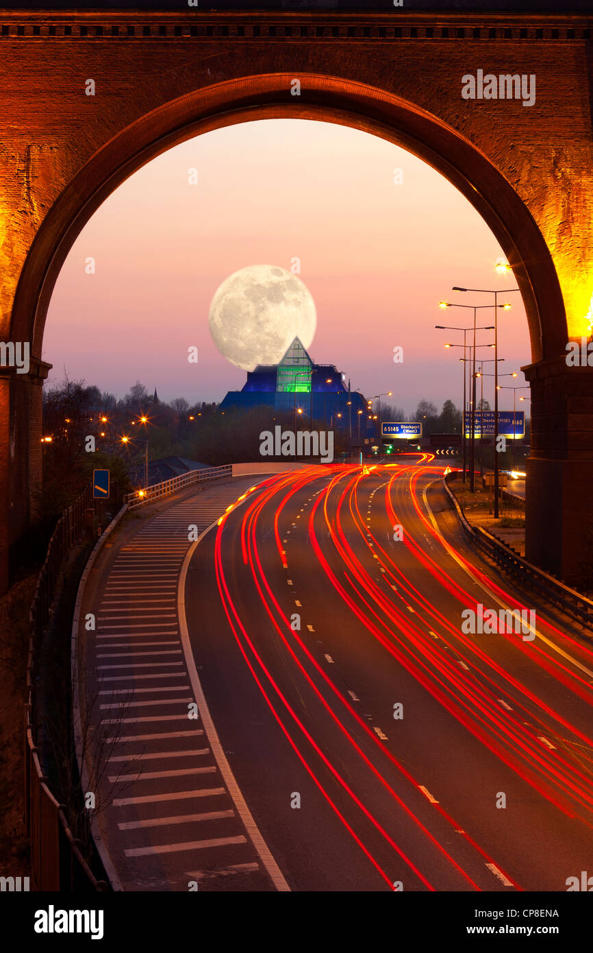 England, Cheshire, Stockport, view of M60 motorway, Viaduct and The Pyramid at twilight Stock Photo