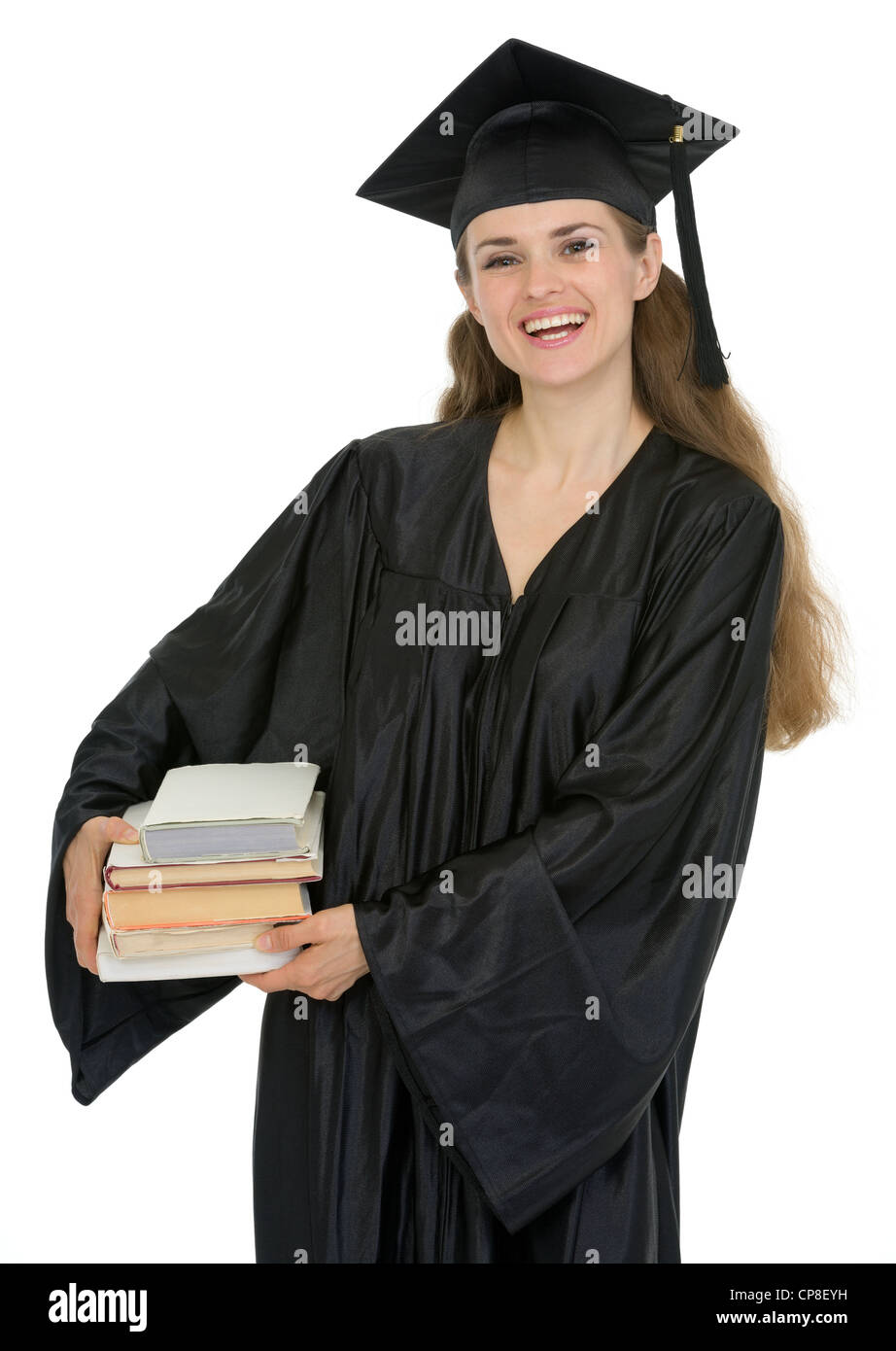 Graduation female student holding stack of books Stock Photo - Alamy