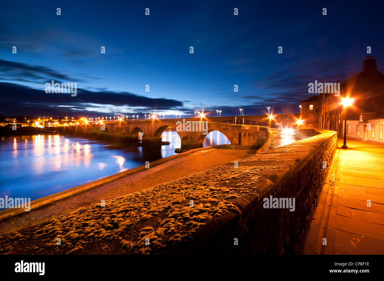 A night time view of the 'Old Bridge' Berwick upon Tweed from the town walls. Stock Photo