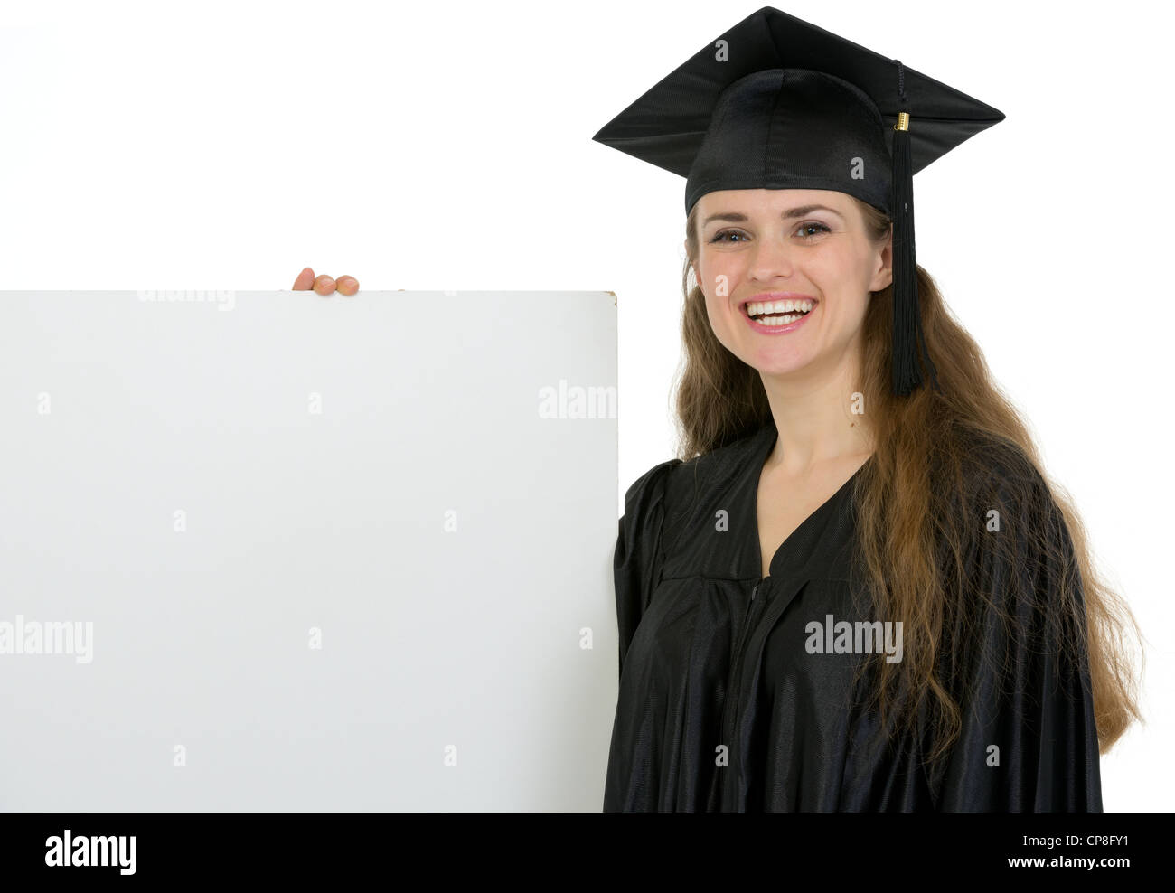 Happy graduation female student holding blank billboard Stock Photo - Alamy
