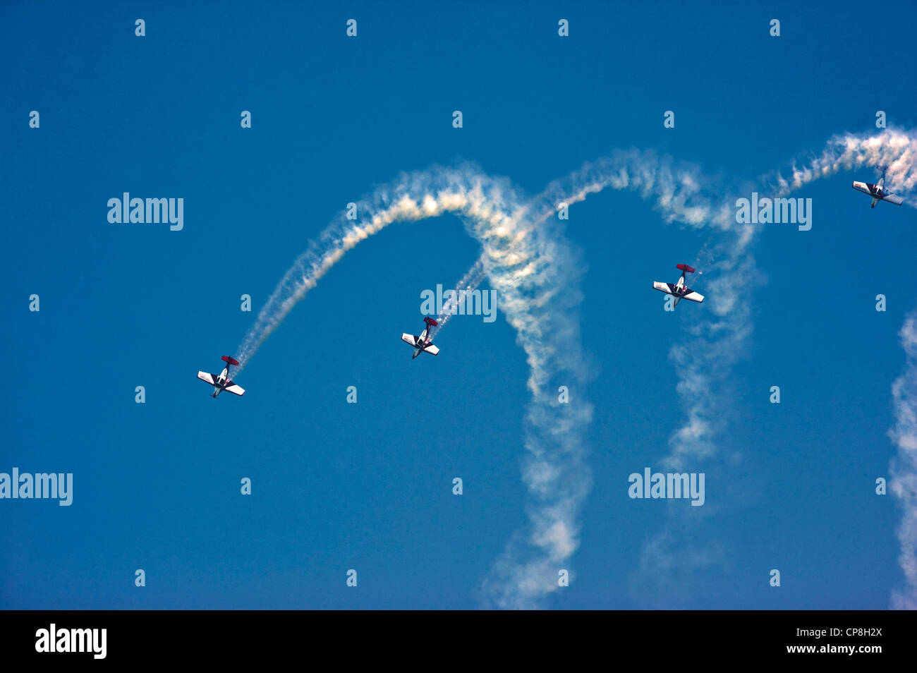 Europe Italy Piedmont Turin  Word Air Games 2009 Planes in flight drawings with colored smoke Stock Photo