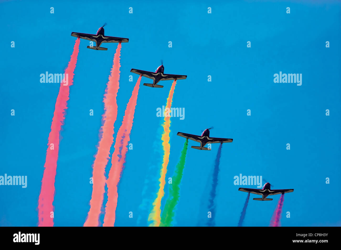 Europe Italy Piedmont Turin  Word Air Games 2009 Planes in flight drawings with colored smoke Stock Photo