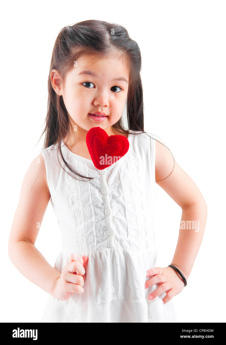 Asian little girl holding a love shape isolated on white background ...