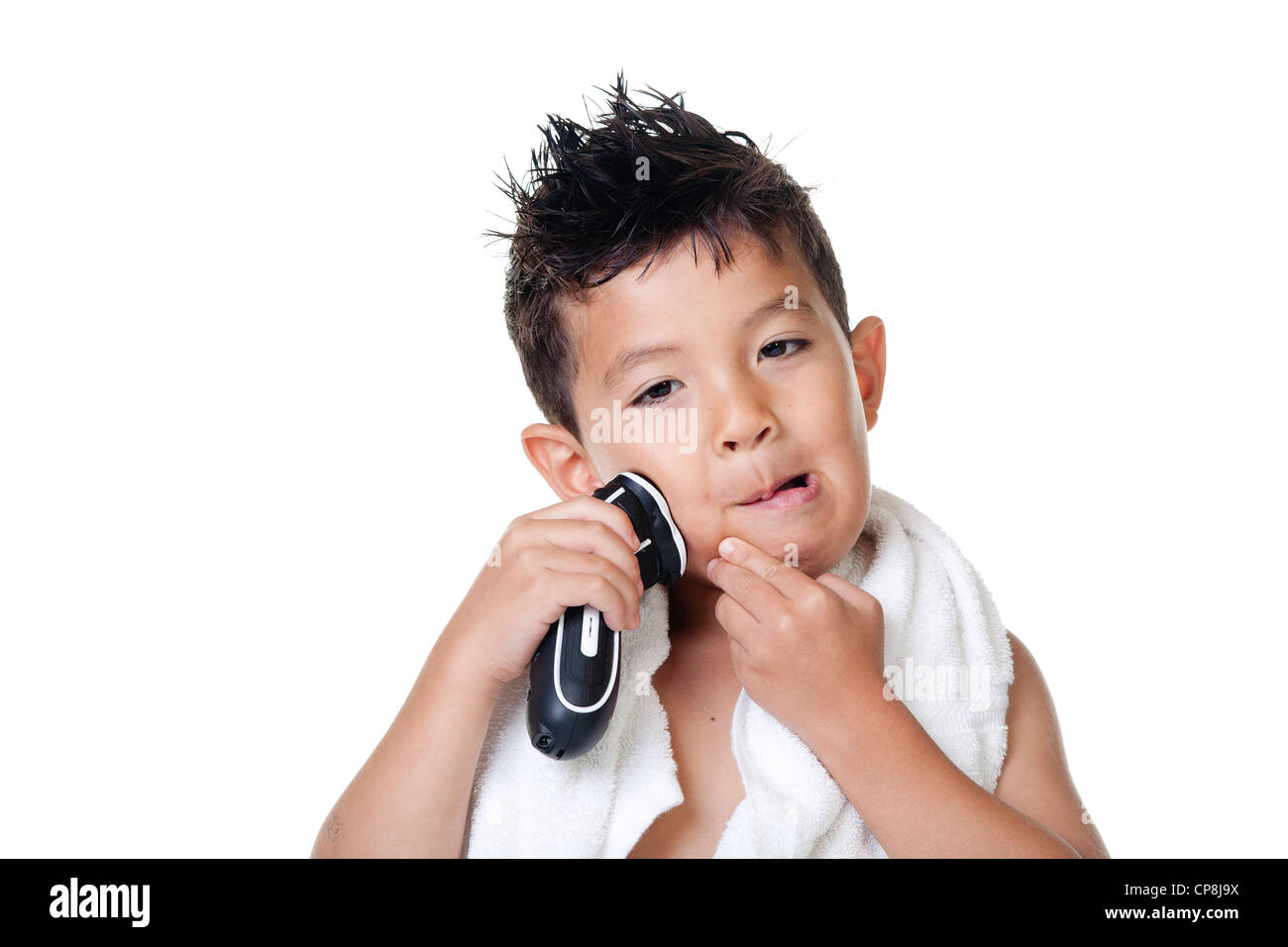 Kids Using Razors Boy has fun pretending to shave with an electric razor Stock Photo - Alamy