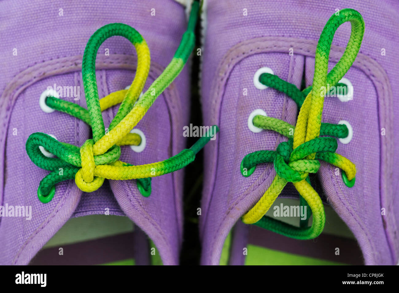 Colourful childs plimsolls Stock Photo