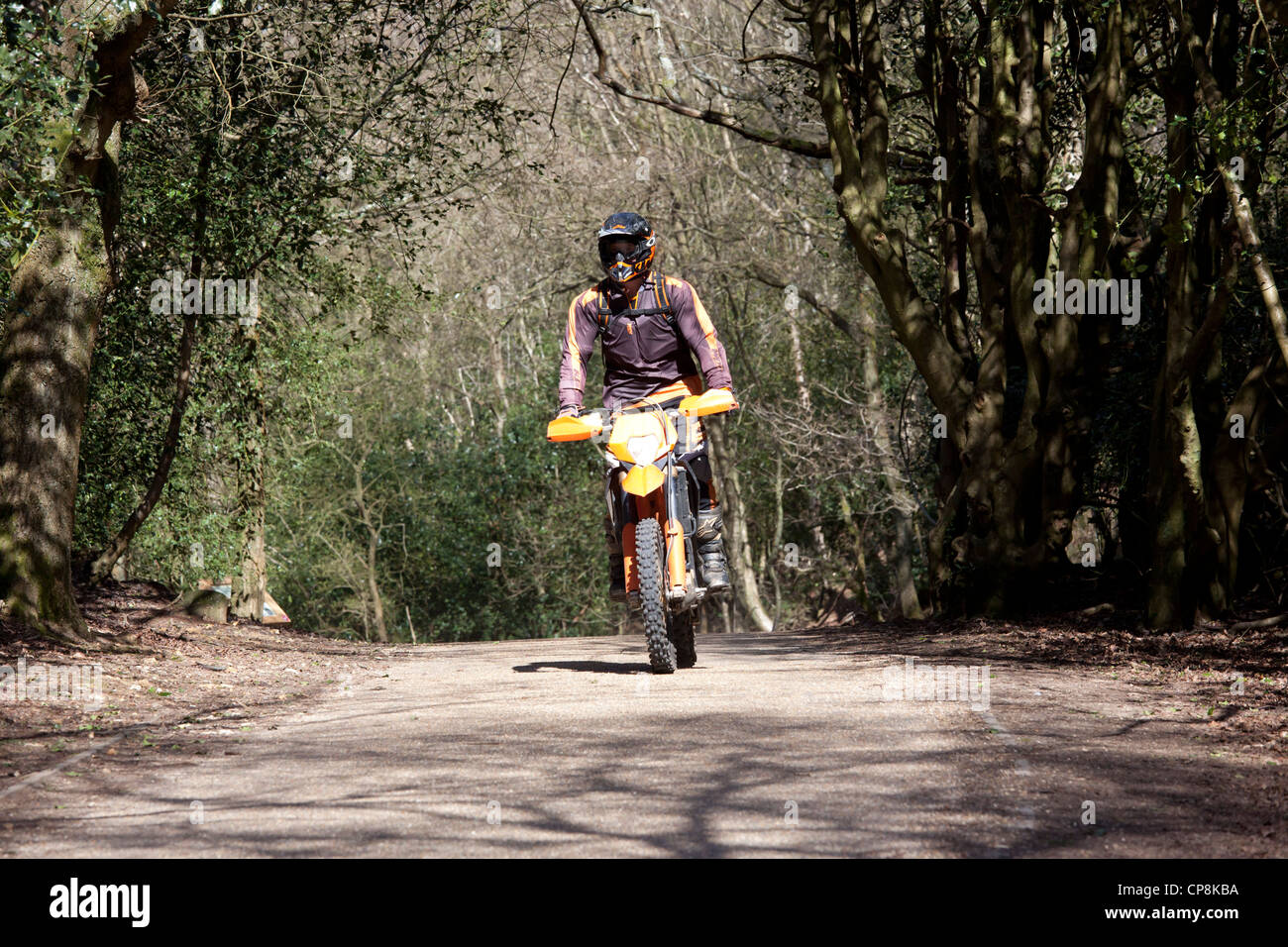 Motorbike on the old Portsmouth road across Hindhead common in Surrey, a byway and a quiet lane Stock Photo
