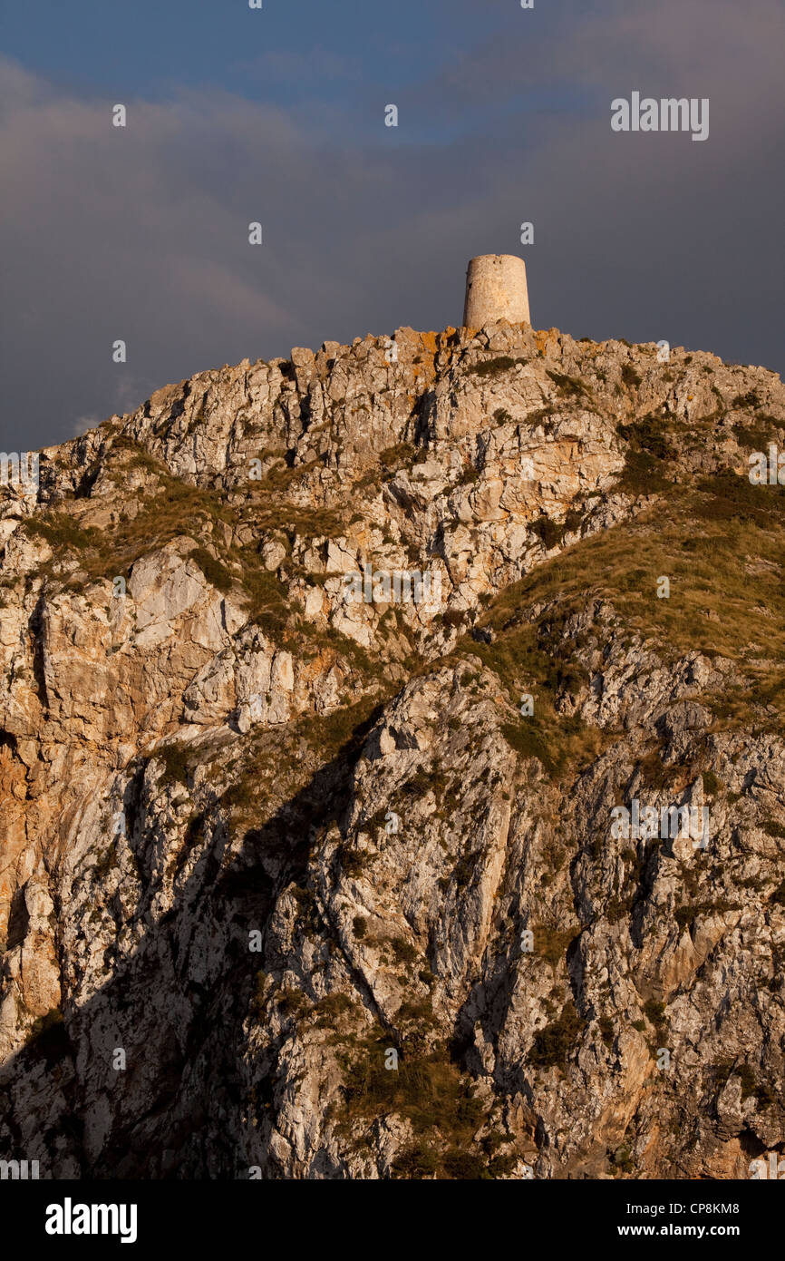 Old watchtower at sunset at the lookout point near Port de Pollenca on the road to Cap de Formentor Stock Photo