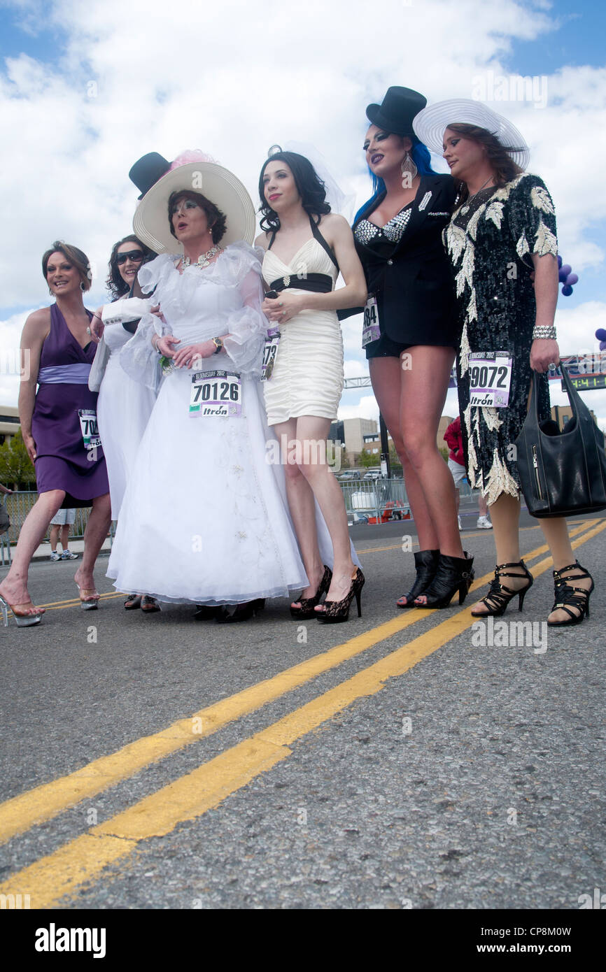 Spokane, Washington - May 6, 2012. Local drag queens walk the entire 7 1/2 miles in high heels at the bloomsday race. Stock Photo