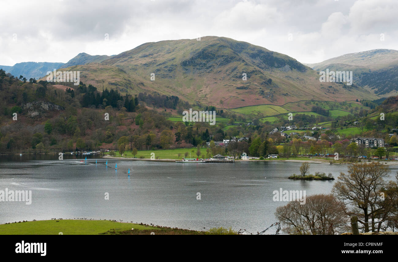 View of Glenridding with Ullswater in foreground and fells behind, Lake District, Cumbria, UK Stock Photo